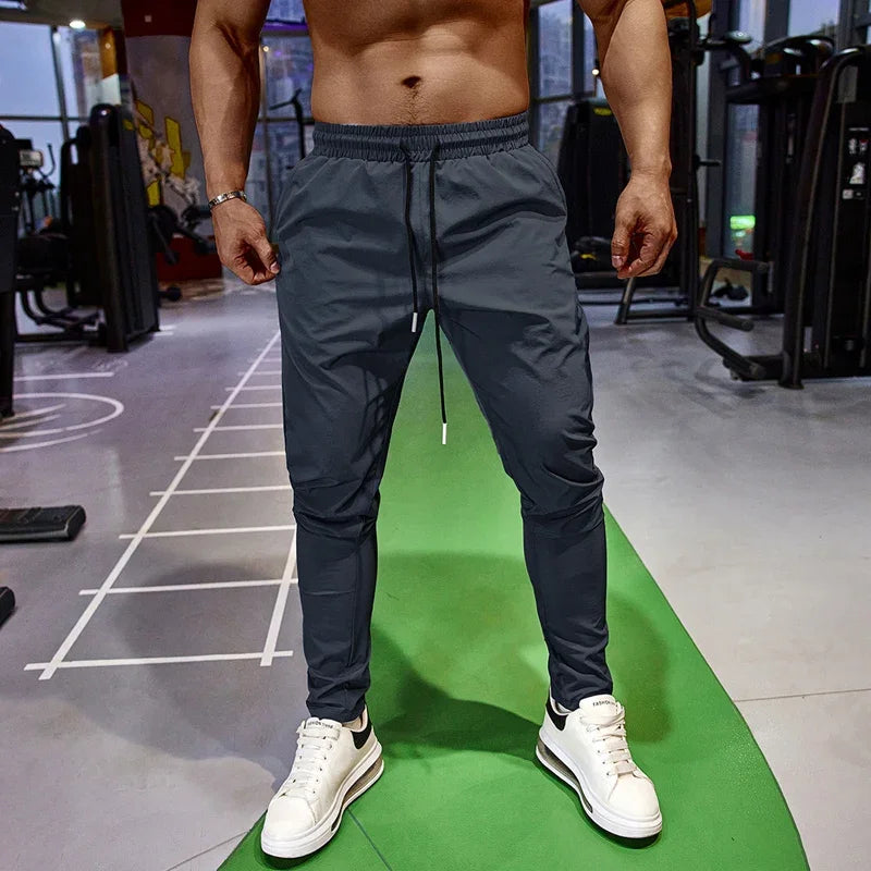 Calça de Corrida Masculina com Cintura Elástica - Ajuste Confortável em Poliéster e Spandex