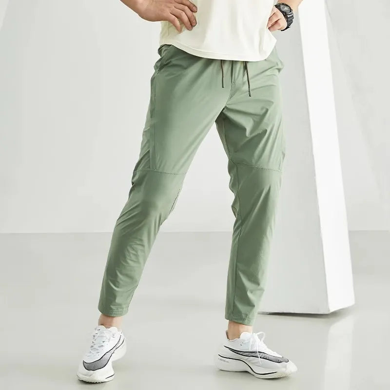 Calça masculina de corrida, calça de treino respirável, calça com cintura elástica, calça de secagem rápida, calça para esportes ao ar livre, calça esportiva masculina, calça para basquete, calça para futebol, moda esportiva masculina, calça de poliéster para esportes