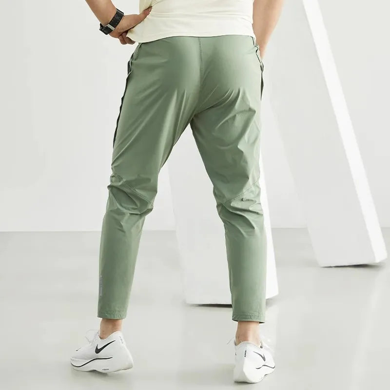 Calça masculina de corrida, calça de treino respirável, calça com cintura elástica, calça de secagem rápida, calça para esportes ao ar livre, calça esportiva masculina, calça para basquete, calça para futebol, moda esportiva masculina, calça de poliéster para esportes
