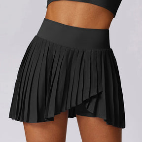 Saia Beach Tennis, saia com shorts integrados, saia de cintura alta, saia para tênis, saia de secagem rápida, saia esportiva feminina, saia com bolsos, saia plissada esportiva, moda fitness feminina, roupa para beach tennis.