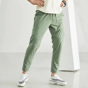 Calça masculina de corrida, calça de treino respirável, calça com cintura elástica, calça de secagem rápida, calça para esportes ao ar livre, calça esportiva masculina, calça para basquete, calça para futebol, moda esportiva masculina, calça de poliéster para esportes