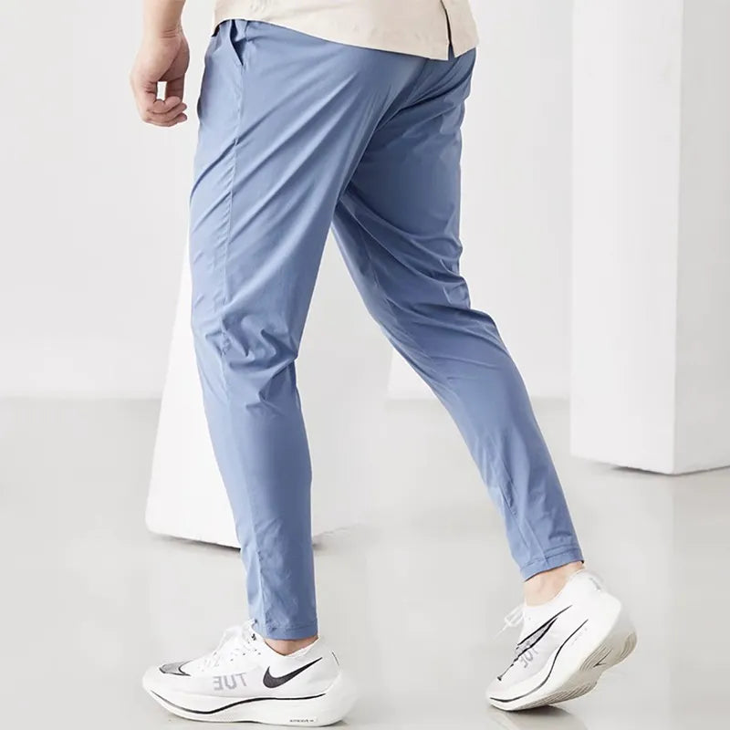 Calça masculina de corrida, calça de treino respirável, calça com cintura elástica, calça de secagem rápida, calça para esportes ao ar livre, calça esportiva masculina, calça para basquete, calça para futebol, moda esportiva masculina, calça de poliéster para esportes